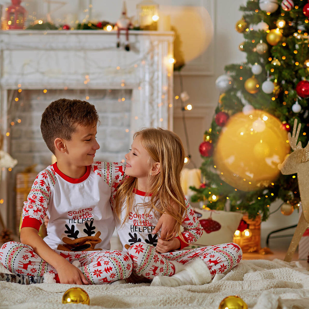 Happy Children in Matching Christmas Pyjamas