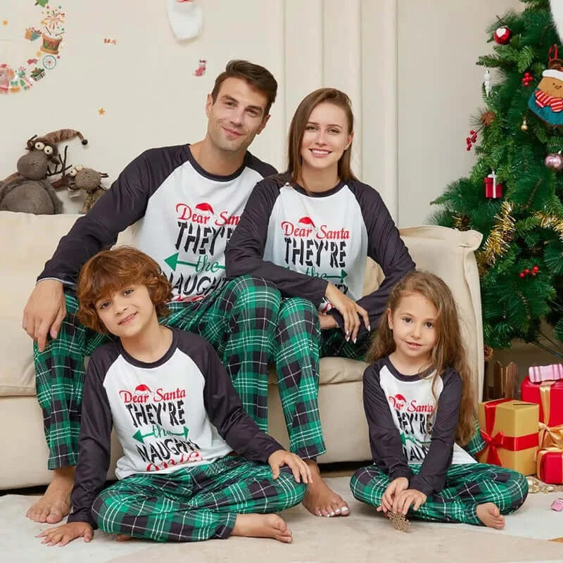 Holiday cheer in family "naughty or nice" jammies