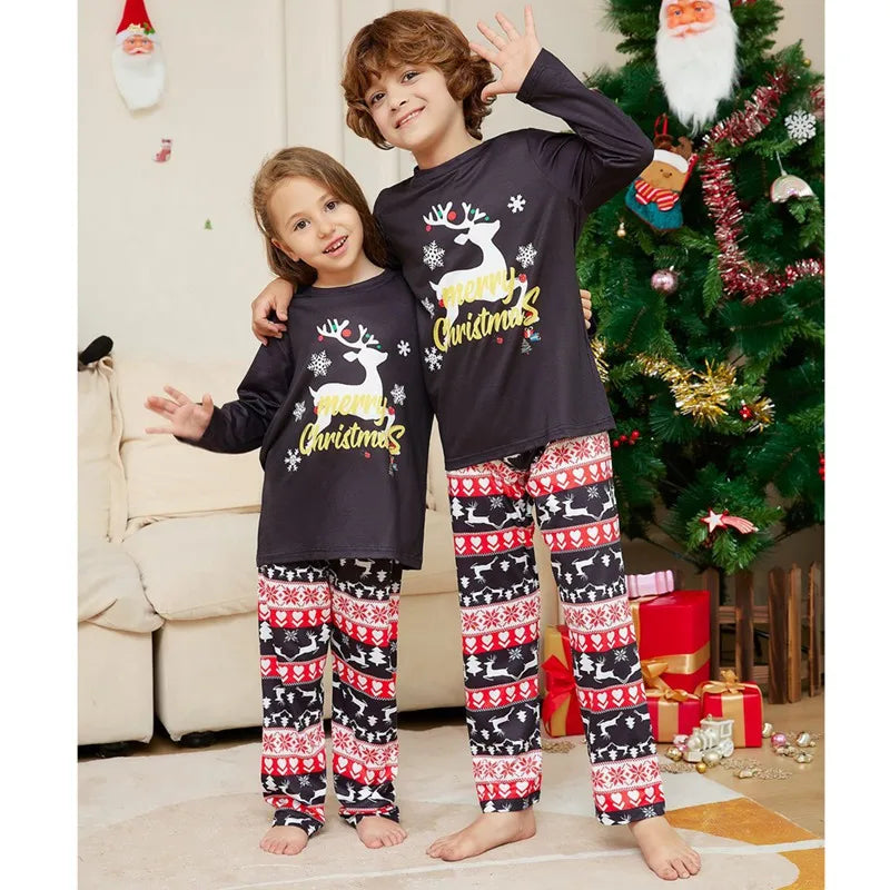 Kids and adults in playful "naughty or nice" pajamas
