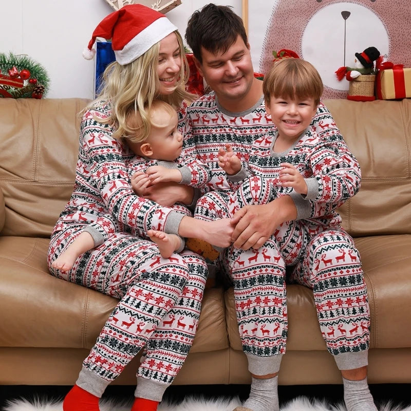 Christmas spirit in coordinated family pajamas