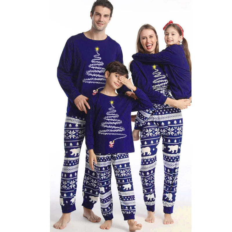 Smiling faces in matching Christmas jammies